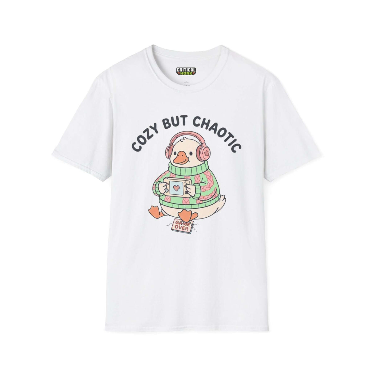 Cozy but chaotic T-Shirt featuring a cute cartoon duck in a sweater, holding a drink on a white fabric background.