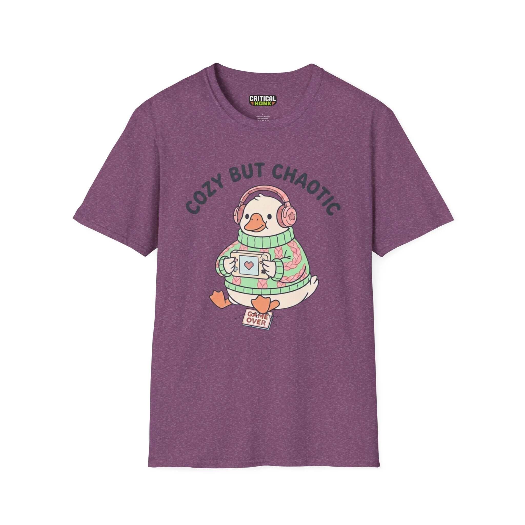 Cozy but chaotic T-Shirt in Heather Maroon featuring a cartoon duck design with headphones and a cup.