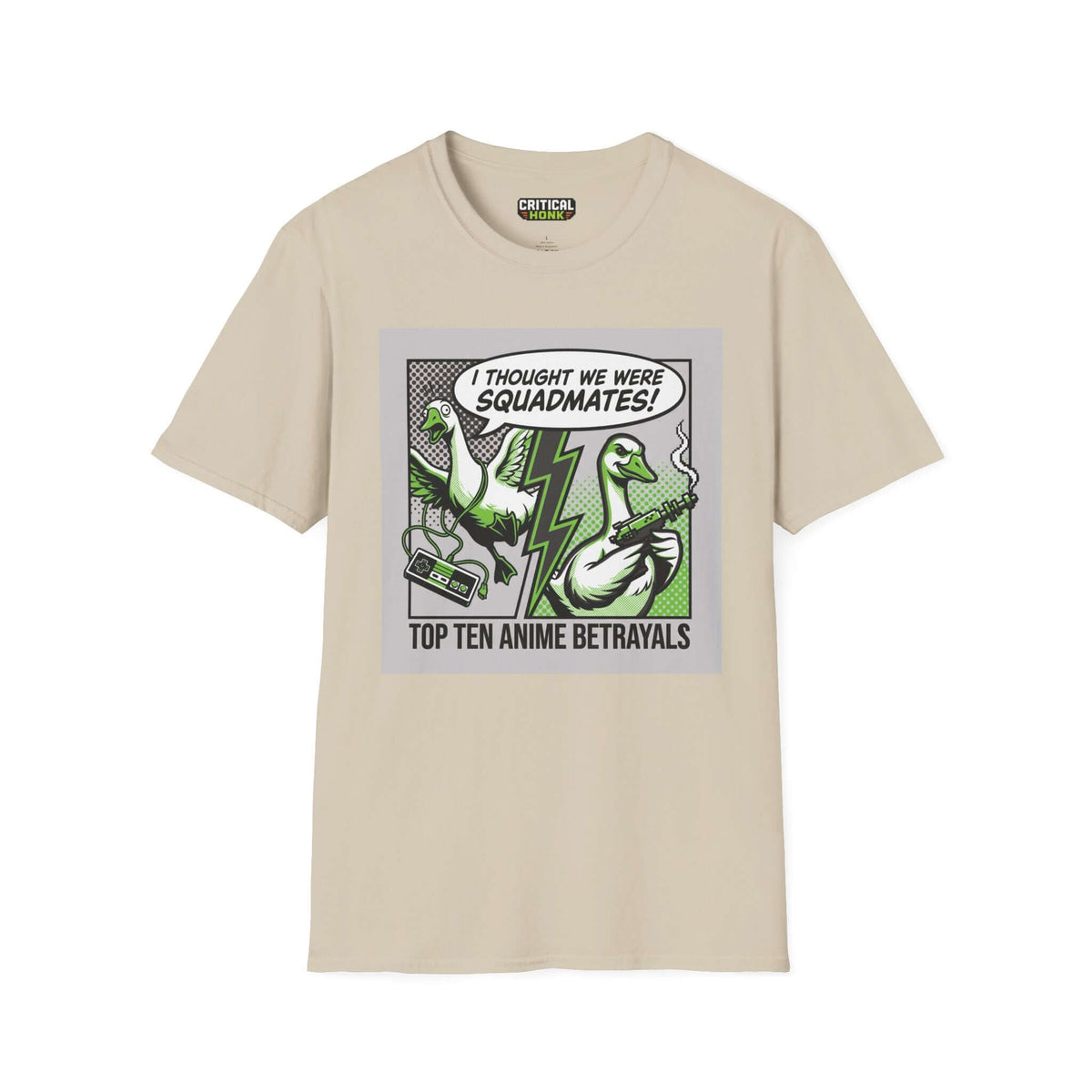 Anime betrayals T-Shirt featuring graphic of ducks and the phrase 'I thought we were squadmates!' on sand colored fabric.